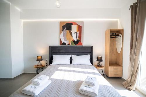 Ліжко або ліжка в номері La Casa New Central Coastal Apartment & Jacuzzi