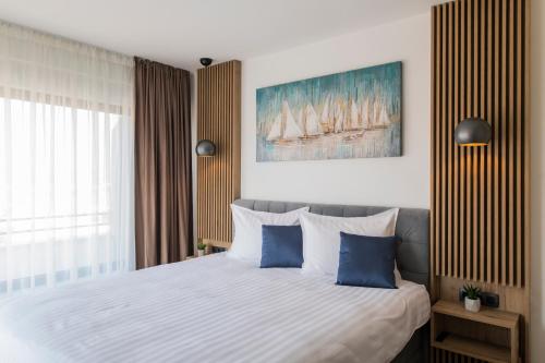 Postel nebo postele na pokoji v ubytování Villa Magna luxury apartments