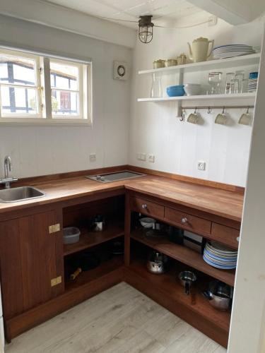 Kuchyň nebo kuchyňský kout v ubytování Tinyhouse Thorøhuse