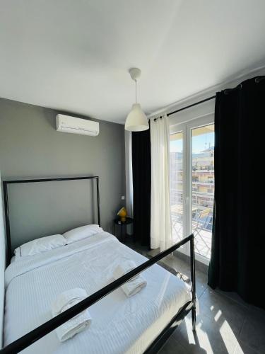 Кровать или кровати в номере City Life Apartments #2