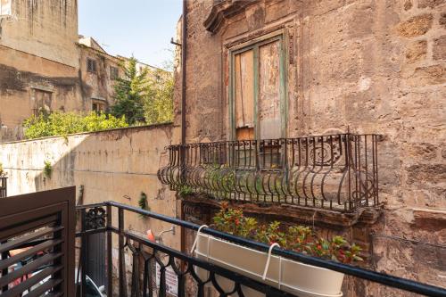 Un balcon sau o terasă la Open Sicily Homes "Residence ai Quattro Canti" - Self check in - Deposito Bagagli