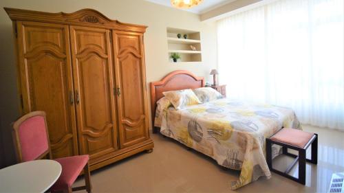 Кровать или кровати в номере Apartamento con vistas al mar en Carril