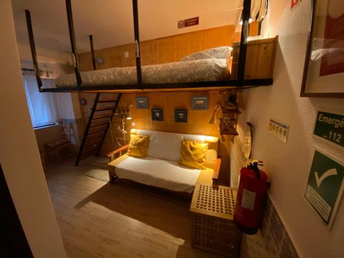 an overhead view of a room with two bunk beds at Estudio T41 - Centro Historico in Lisbon