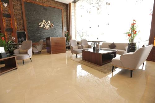 Posezení v ubytování Msharef Almoden Serviced Apartment