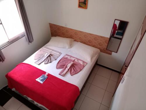 Postel nebo postele na pokoji v ubytování Pousada Adorno