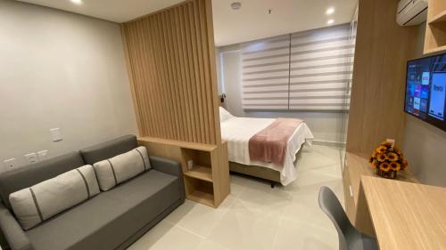 Cama o camas de una habitación en Estudio Em Itaipava - Granja Brasil - Flat Luxo - Com Piscina Aquecida