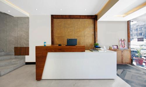 an office with a large white counter in a room at Itsy By Treebo - Amrita in Jammu