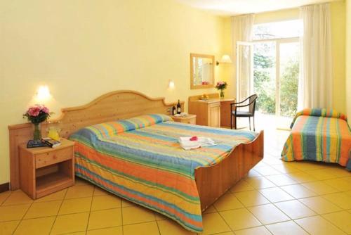 Letto o letti in una camera di Hotel Marco Polo