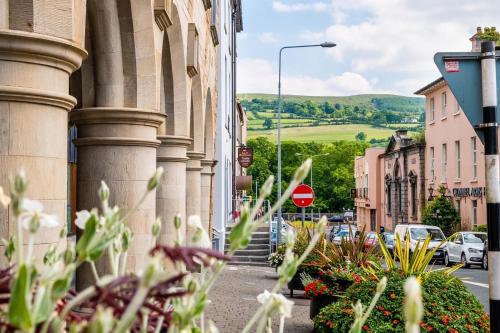 a street in a town with a stop sign at Befani's Mediterranean Restaurant & Townhouse in Clonmel