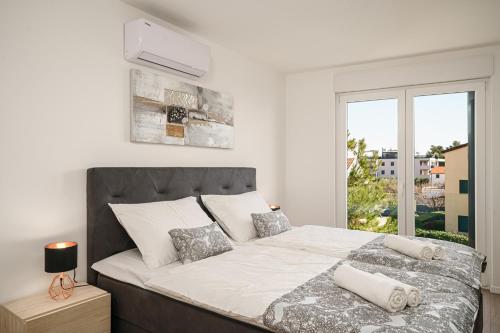 Postel nebo postele na pokoji v ubytování Apartment SABBIA