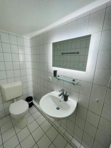 Ένα μπάνιο στο Schickes Sylt Apartment in Westerland mit Garten nahe Strand