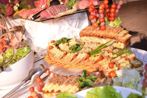 a table topped with lots of different types of food at Cap Bon Kelibia Beach Hotel & Spa in Kelibia