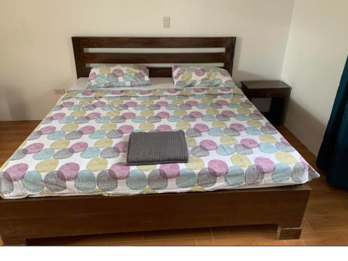 Кровать или кровати в номере Palm Tree Lodge