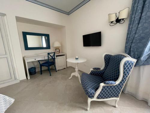 TV a/nebo společenská místnost v ubytování Relais Antiche Saline