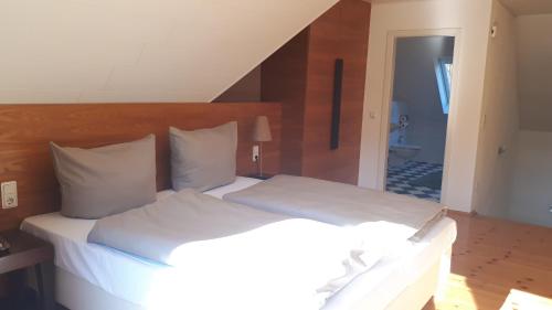 Letto o letti in una camera di Hotel Habichtstein
