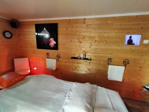 Postel nebo postele na pokoji v ubytování Le Clos du Clocher
