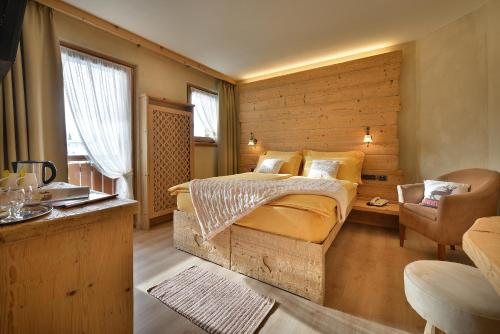 Postel nebo postele na pokoji v ubytování Hotel Garnì COSTANZA