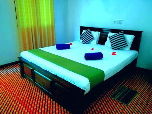 Voodi või voodid majutusasutuse Lakmal Homestay ,10 minutes to Sigiriya Rock toas