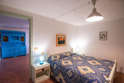 A bed or beds in a room at Agriturismo Monte della Dea