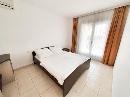 Un ou plusieurs lits dans un hébergement de l'établissement Apartments Prajo, Orebić