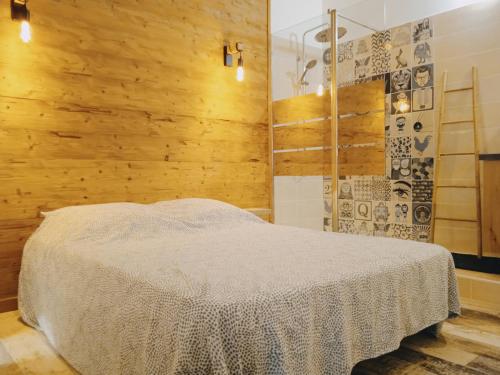 Krevet ili kreveti u jedinici u okviru objekta Gite du Mas de la Finière ,avec SPA intérieur