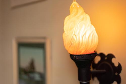 an ice cream cone on top of a light at La Rosa Hotel in Whitby