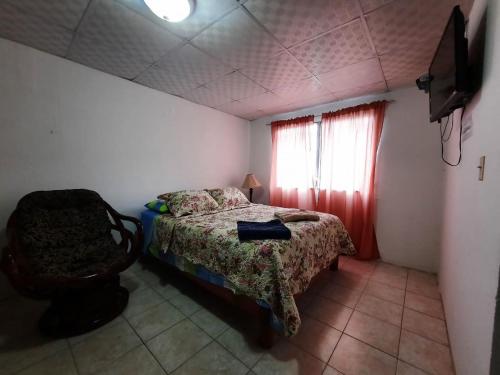 En eller flere senge i et værelse på Apartamento Cacao Changuinola