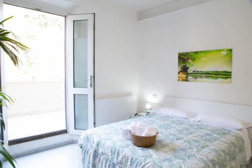 Katil atau katil-katil dalam bilik di Guest House Oasi Dei Mille