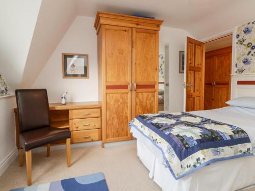 Un pat sau paturi într-o cameră la Rothay