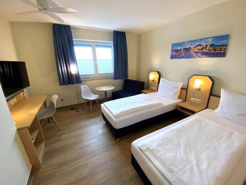 Gallery image of Hotel Am Wiesenweg l 24h check-in in Hausen