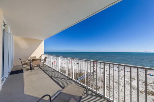a balcony with a view of the beach at San Carlos Unit 607 in Gulf Shores