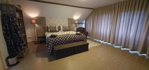 Katil atau katil-katil dalam bilik di Bed & Breakfast Ravelin