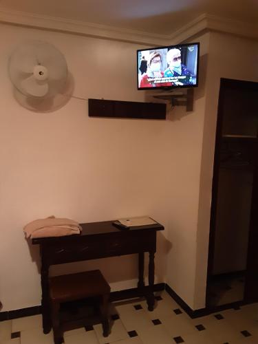 TV a/nebo společenská místnost v ubytování Hostal El Molino