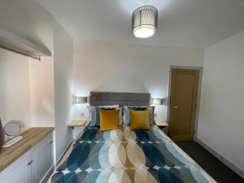 Cama o camas de una habitación en Lees Lookout Holt ,2 bedroom luxury apartment with private parking