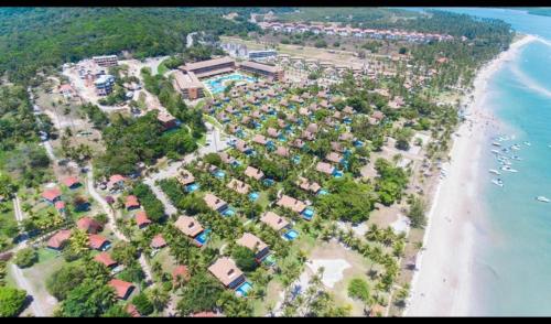 an aerial view of a resort next to the beach at Eco Resort Praia dos Carneiros - Flat 218 CM in Tamandaré
