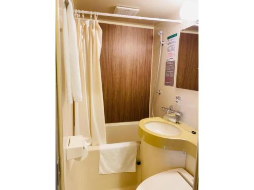 Et badeværelse på Hotel Relief SAPPORO SUSUKINO - Vacation STAY 22951v