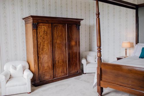 Postel nebo postele na pokoji v ubytování Noan Country House B&B