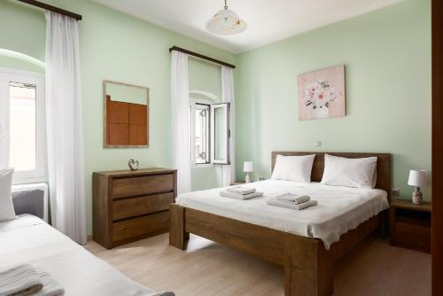Кровать или кровати в номере Casa Corfiota