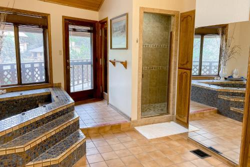 a bathroom with a walk in shower and a walk in shower backdoor at Sedona Serenity in Sedona
