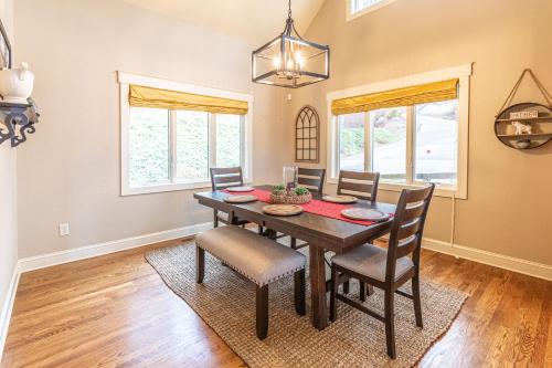 a dining room with a table and chairs at Mountain-View Hideaway in Waynesville