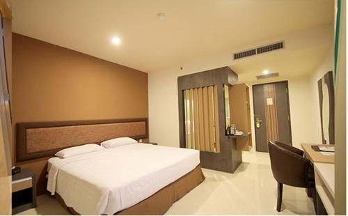 Postel nebo postele na pokoji v ubytování Hotel Olive