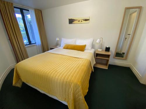 Postel nebo postele na pokoji v ubytování Motel On York