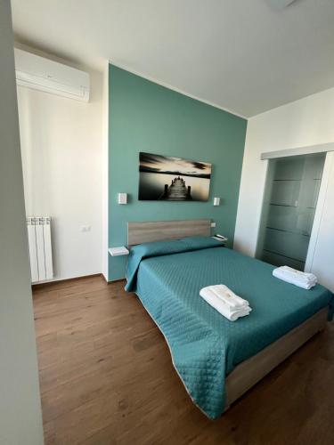 Posteľ alebo postele v izbe v ubytovaní B&B Alis Home