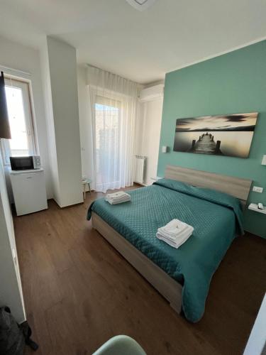 Posteľ alebo postele v izbe v ubytovaní B&B Alis Home