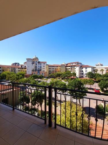 a balcony with a view of a city at Island Club by Smart City Stays in Cape Town