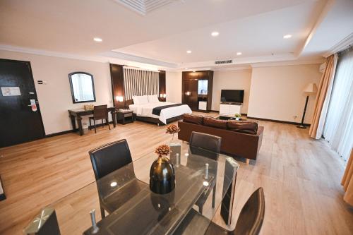 Гостиная зона в PRIME CITY HOTEL KLUANG