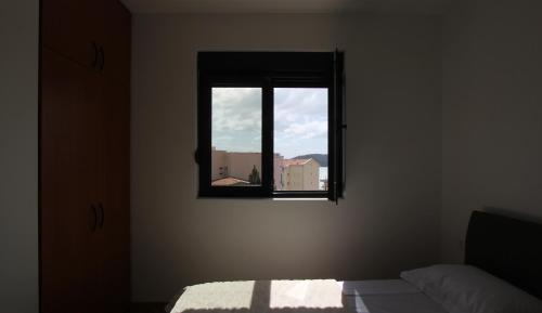 Cama o camas de una habitación en Sea view apartment in Becici