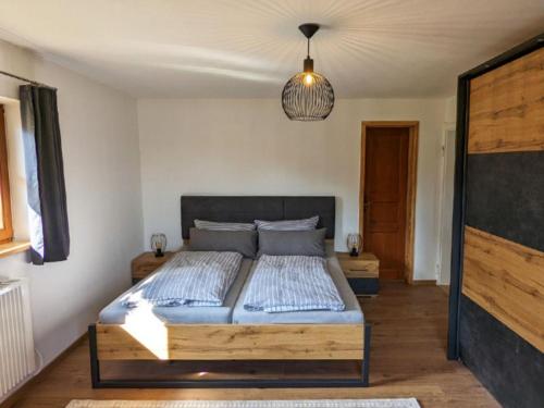 Postel nebo postele na pokoji v ubytování Landhaus GLÜCKSmoment