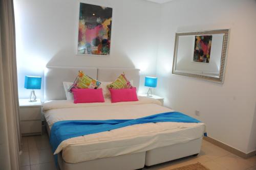 Una cama o camas en una habitación de Prime Hotel