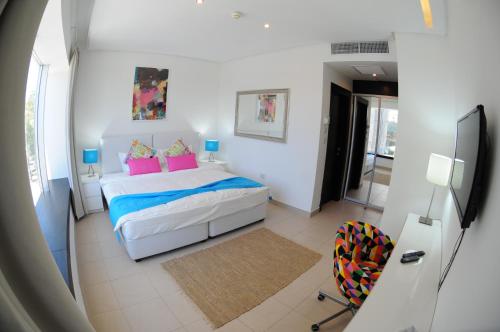 Una cama o camas en una habitación de Prime Hotel
